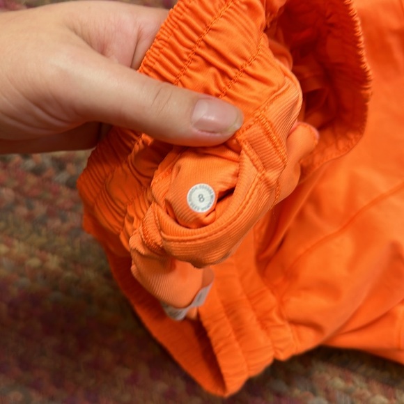 SOLD LULULEMON BRIGHT HIGHLIGHT ORANGE HOTTY HOT SHORTS - Picture 7 of 7